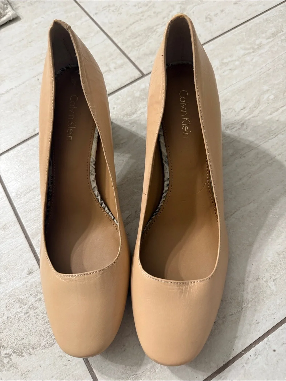 Calvin Klein sophisticated tan